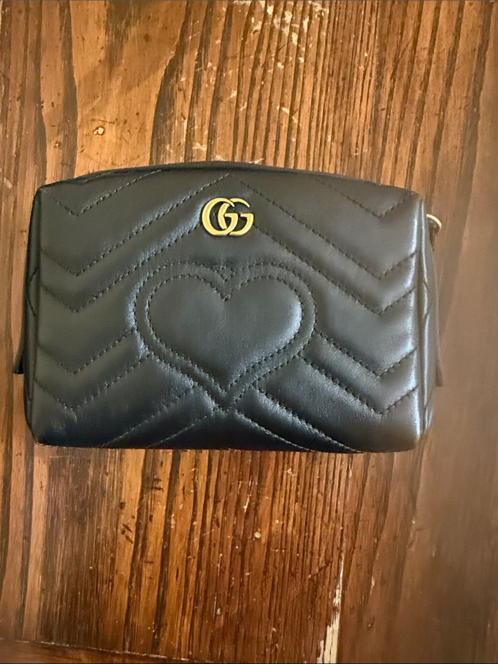 Gucci Black Quilted Leather Cosmetic Case will come with bag insert